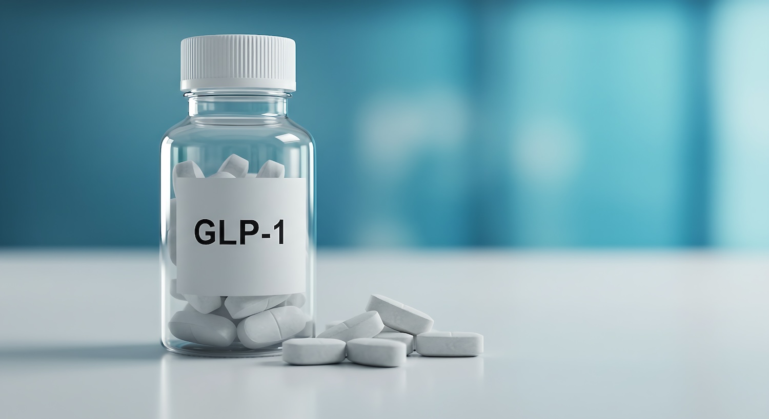 Clear bottle labeled “GLP-1” containing white tablets, with several tablets placed on a flat surface beside it.